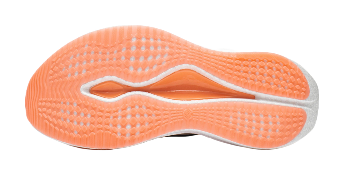 Women's running shoe outsole, orange textured tread with white sidewall and edge