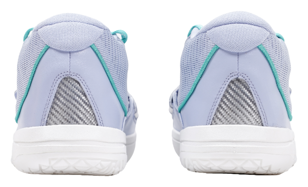 Light blue sneakers rear view with teal trim and white cushioned sole