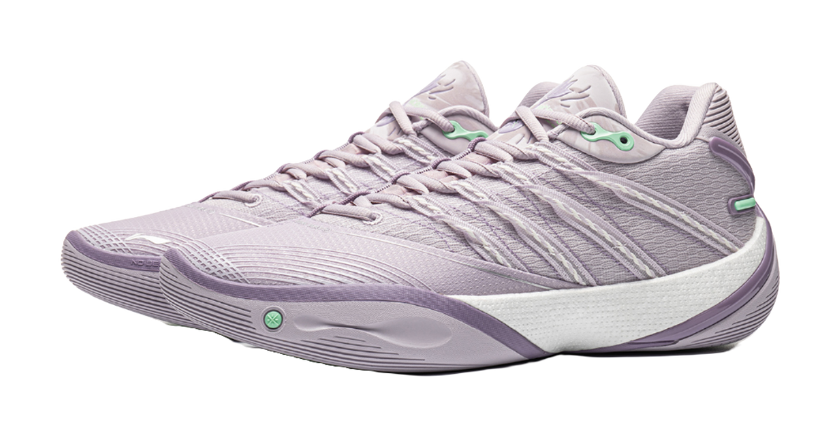 Lavender low basketball sneaker with textured overlays, lace-up front, mint heel logo
