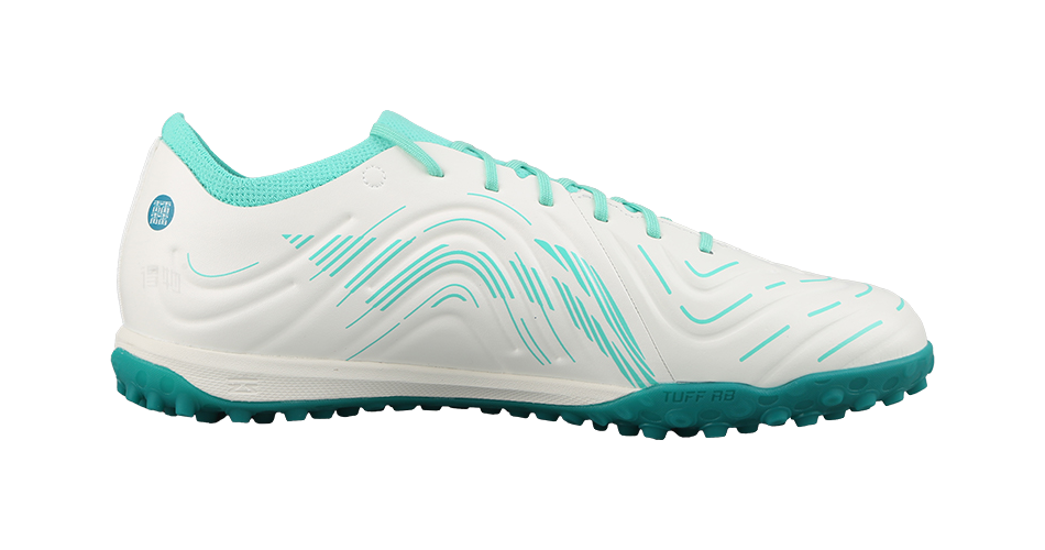 Unisex soccer cleat in white with teal stripes, TF turf sole and studs
