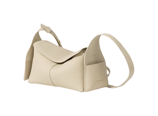 Mini cow leather shoulder bag in cream with top flap and curved front stitching