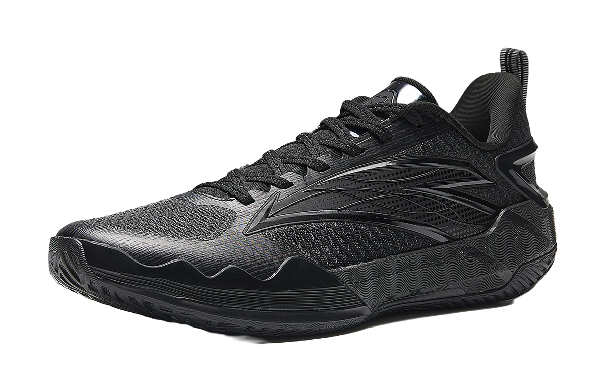 Low-top basketball sneakers in dark black/gray with lace-up front and side logo panels