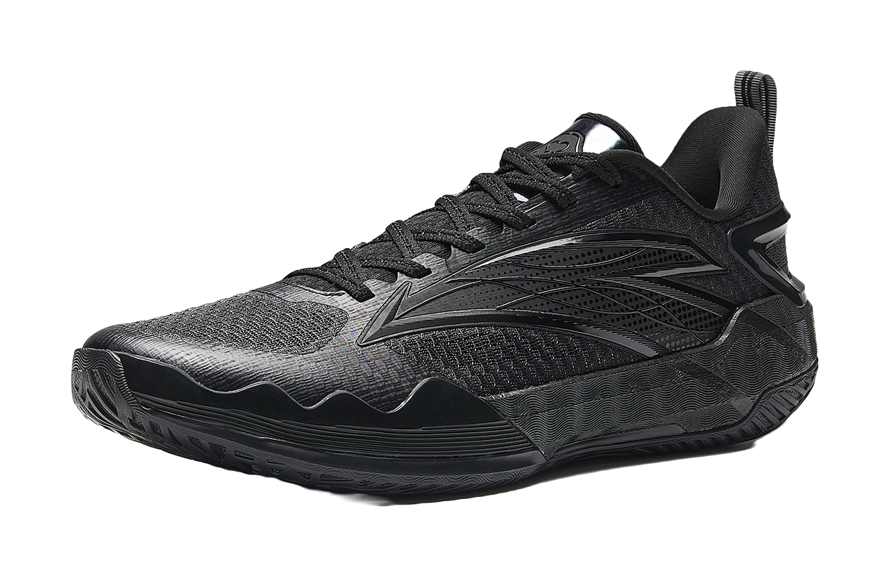 Low-top basketball sneakers in dark black/gray with lace-up front and side logo panels