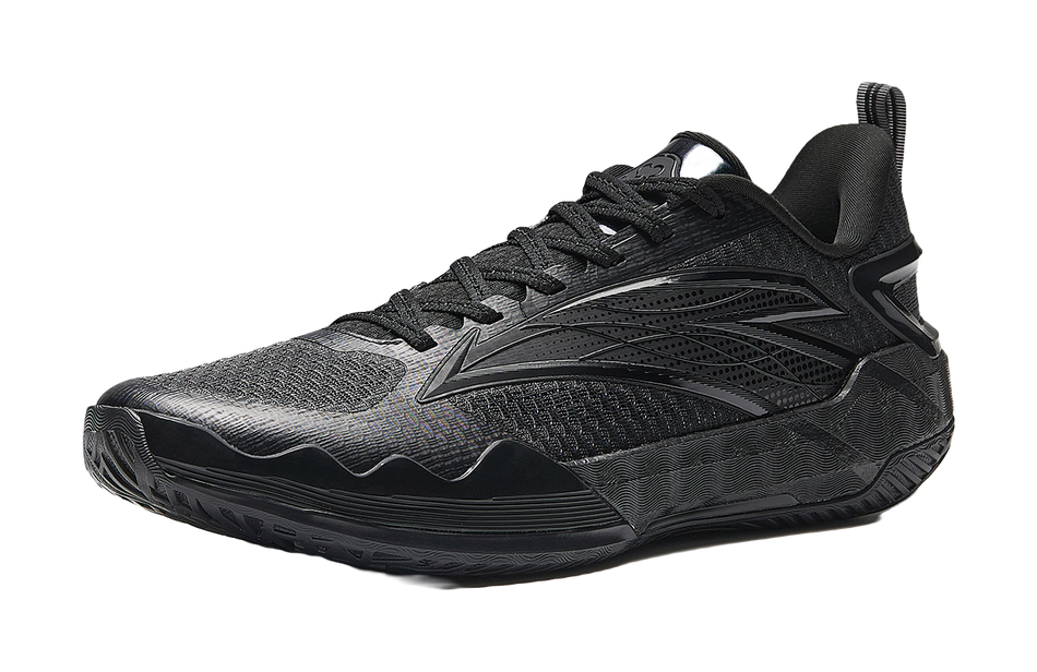 Low-top basketball sneakers in dark black/gray with lace-up front and side logo panels