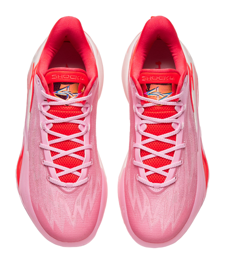 Pink lace-up basketball shoes with red laces and padded tongue collar
