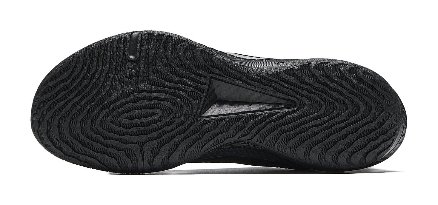 Black basketball shoe outsole tread with textured pattern and sidewall detailing