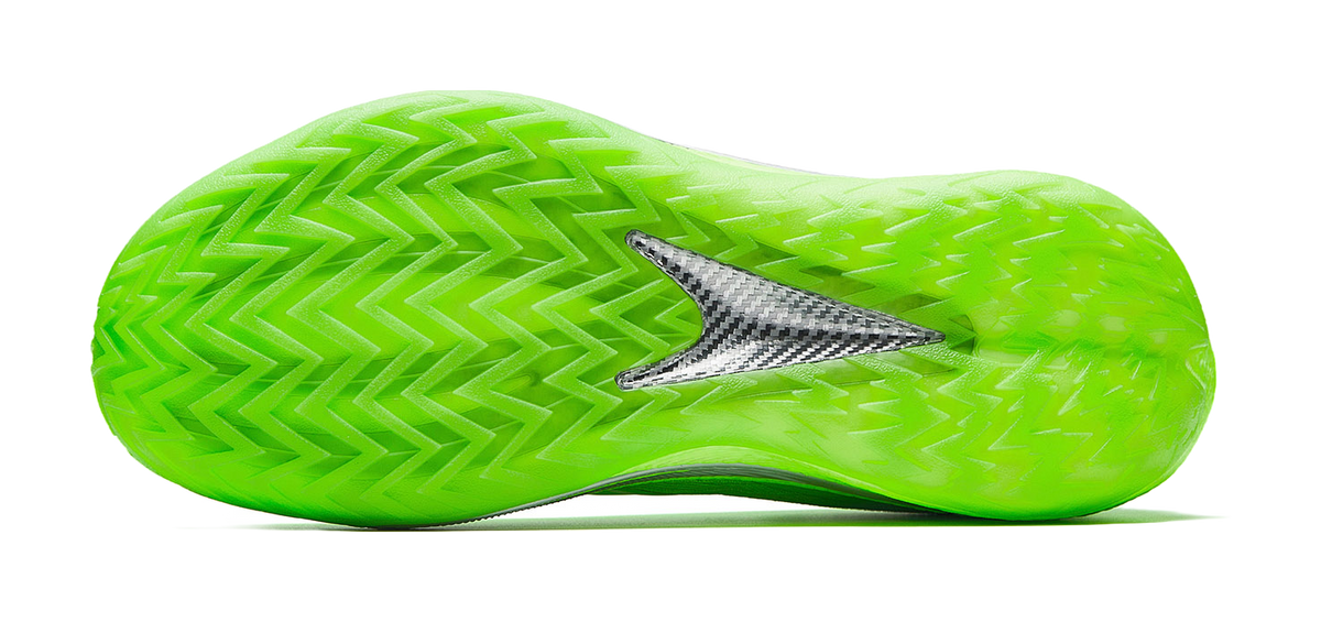 Fluorescent green low-top basketball shoe with zigzag outsole tread and side stripe