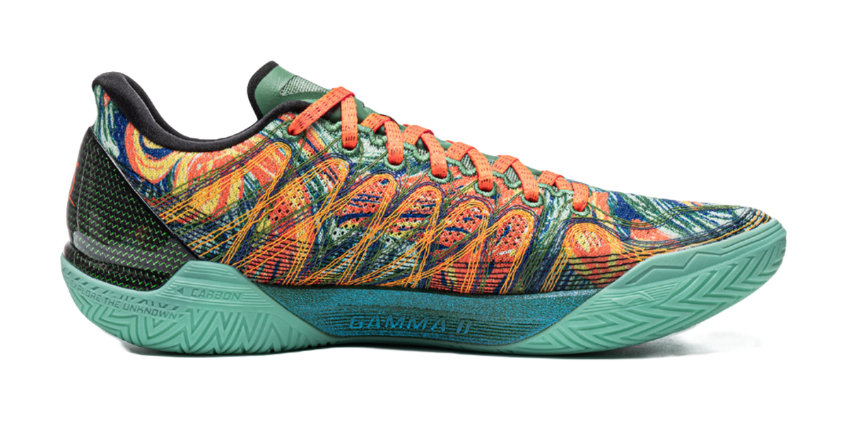 Men's low-top basketball shoes with patterned multicolor upper and teal outsole.