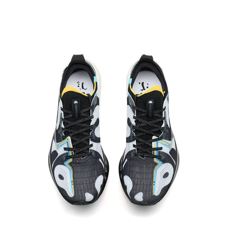 Marathon racing shoe pair view, black upper with white graphics, yellow collar lining