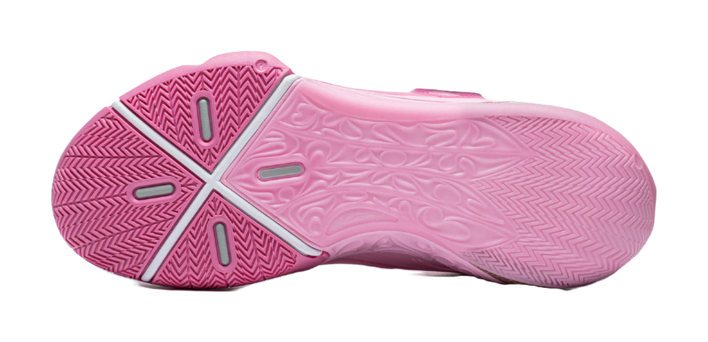 Pink basketball sneaker outsole view with X-shaped traction pattern
