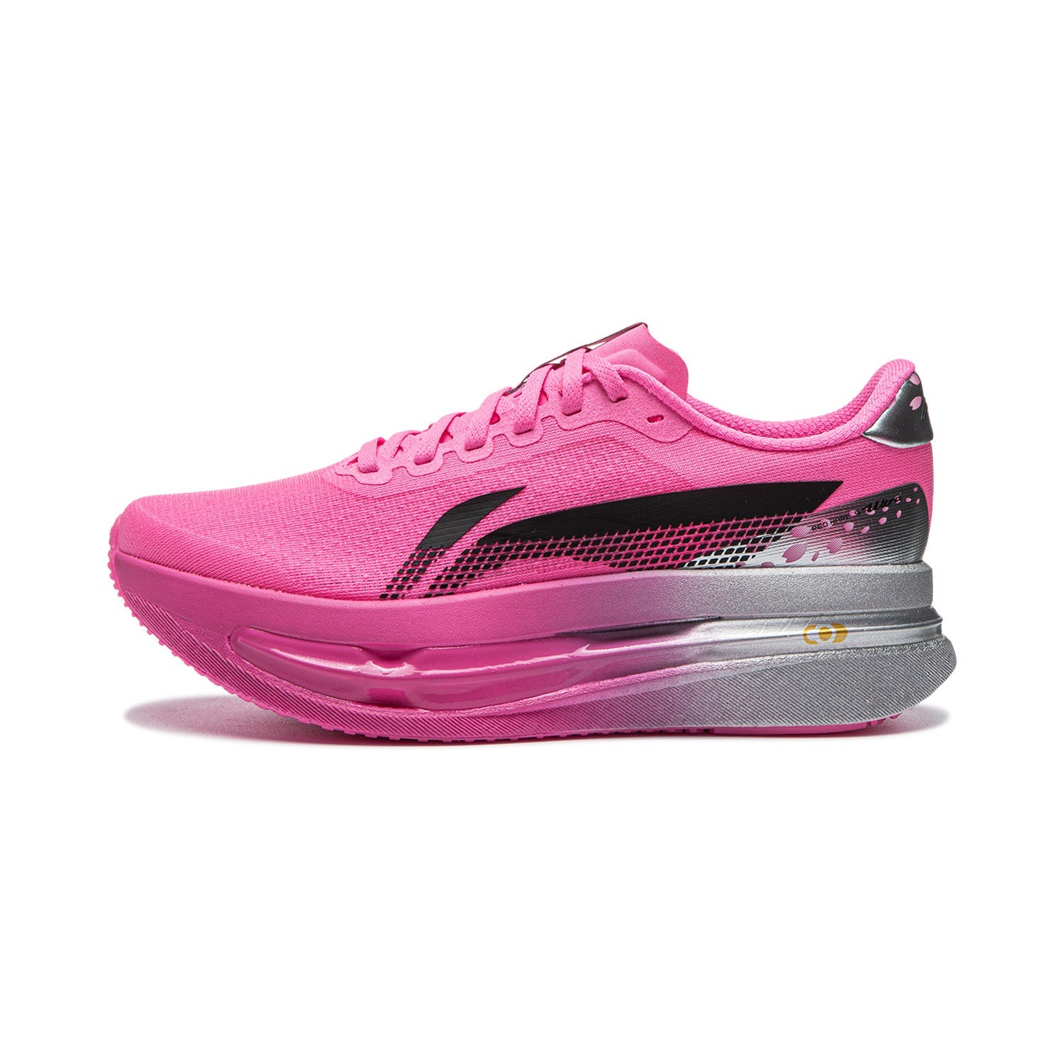 Women's pink running shoe with black logo, lace-up knit upper, gray cushioned sole