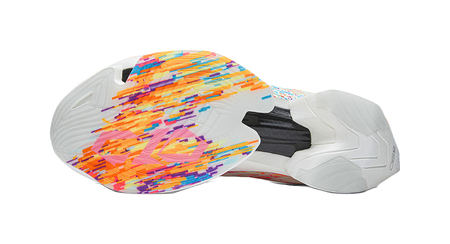 White marathon shoe with orange, purple, and blue patterned upper and rugged sole.
