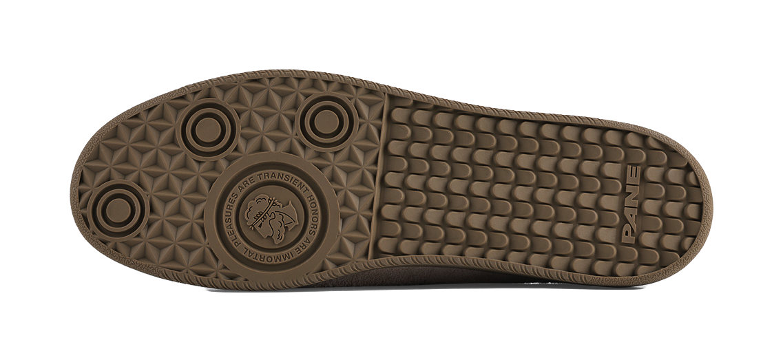 Textured rubber outsole for khaki low-top sneakers with traction pattern