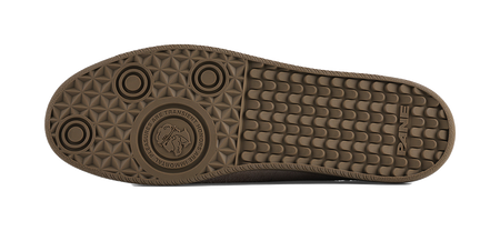 Textured rubber outsole for khaki low-top sneakers with traction pattern