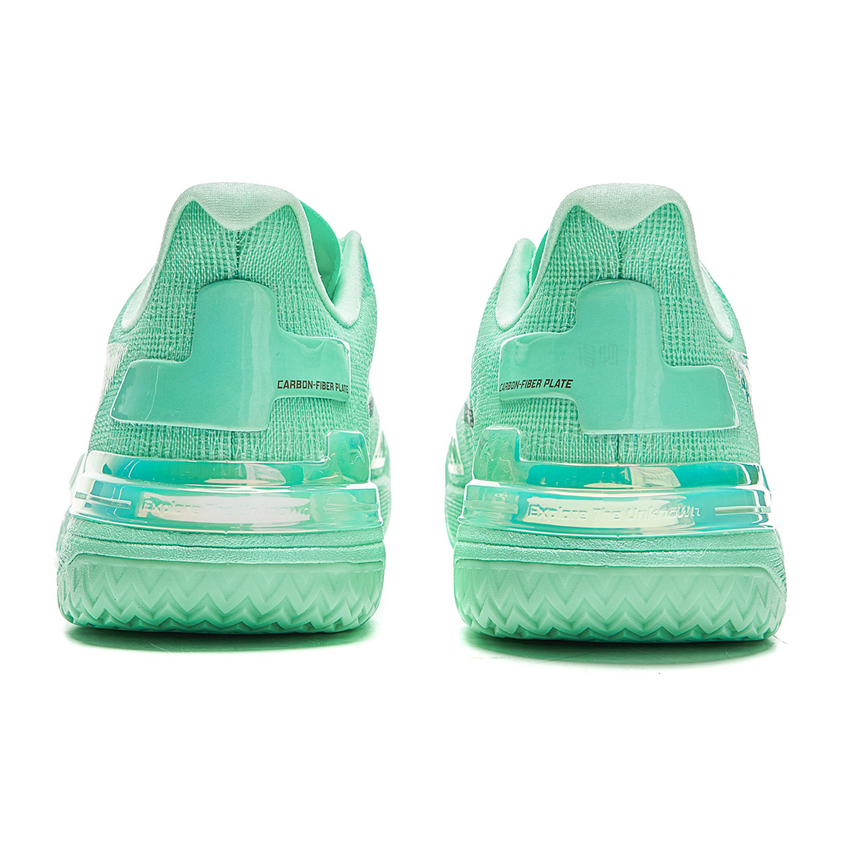 Basketball shoe heel view with mint-green back panel and treaded midsole cushioning.