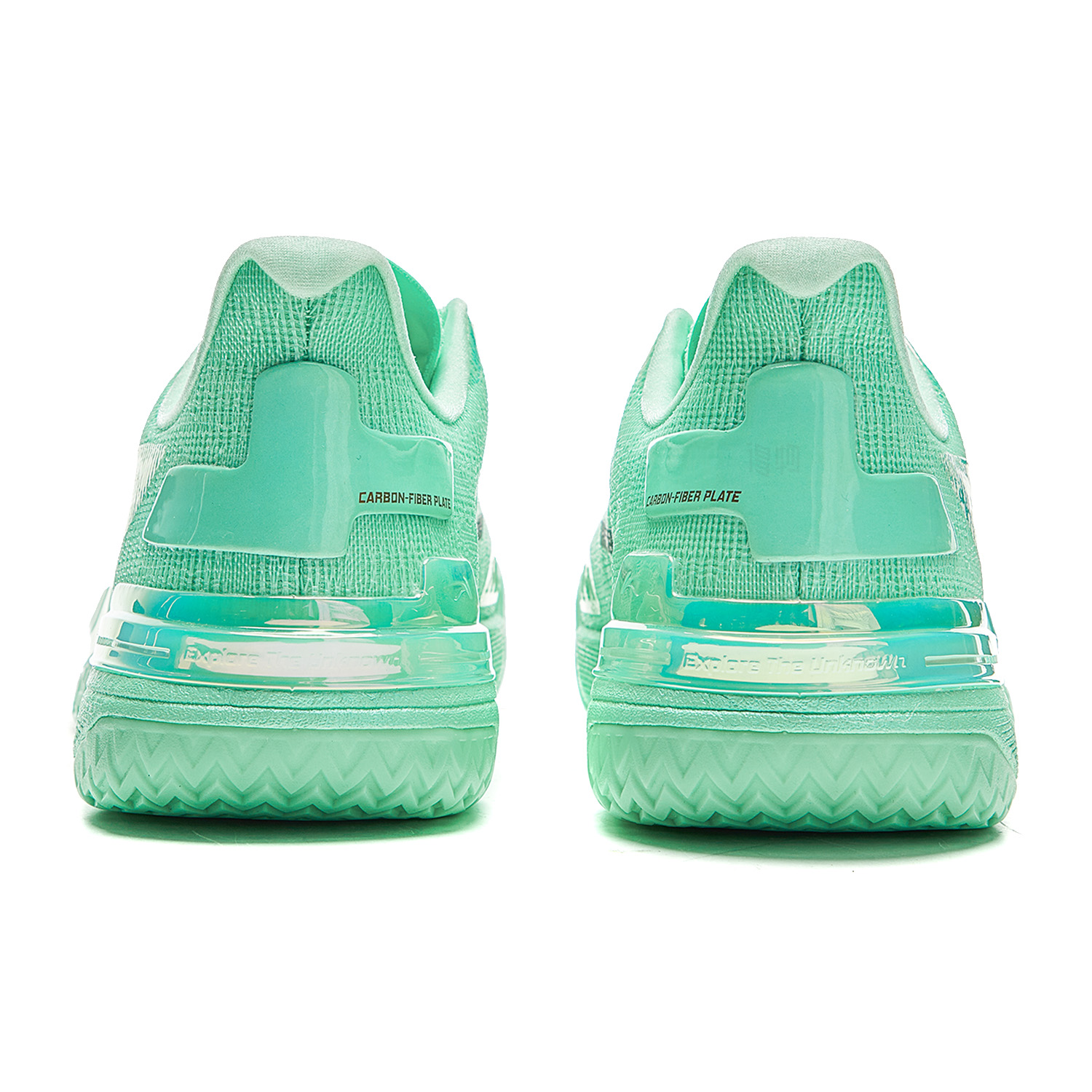 Basketball shoe heel view with mint-green back panel and treaded midsole cushioning.
