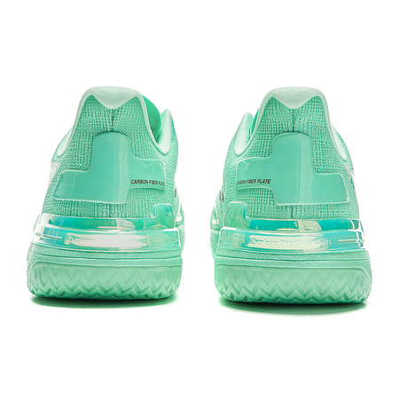 Basketball shoe heel view with mint-green back panel and treaded midsole cushioning.