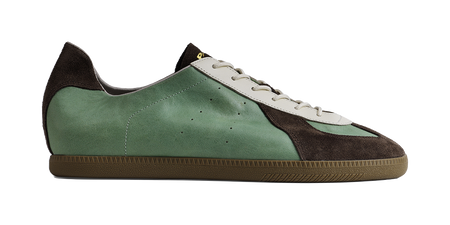 Mint low-top lace-up shoe with dark side panels and textured rubber sole