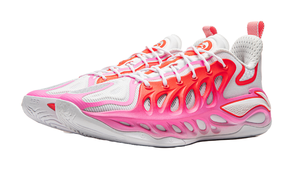 Unisex basketball shoe, toe-side angle with pink, red, and white layered design