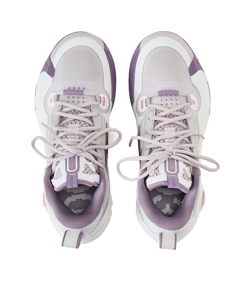 Grey and white low-top basketball shoes with lavender laces and tongue tabs (top view)