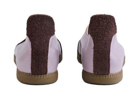 Rear view of lavender low-top shoes with dark brown heel panels and gum textured sole