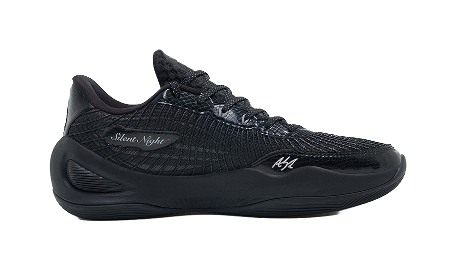 Unisex black basketball shoe with “Silent Night” patch and molded outsole