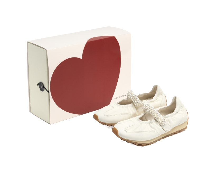 Women's white Mary Jane shoes with pearl strap and textured brown outsole