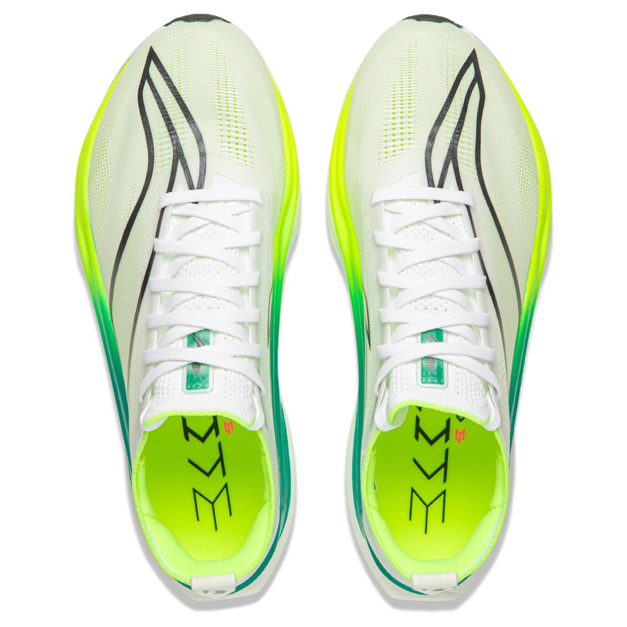 Pair of white racing shoes with neon green lining, lace-up upper.