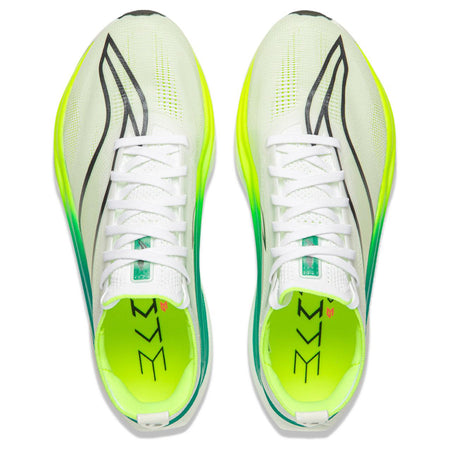 Pair of white racing shoes with neon green lining, lace-up upper.