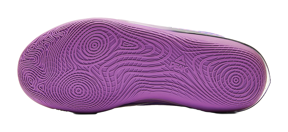 Crystal purple basketball shoe outsole with molded tread pattern