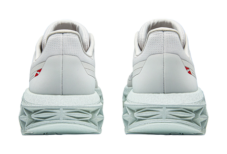 Pair of Anta low-top running shoes, light gray, rear view with cushioned heel and tread