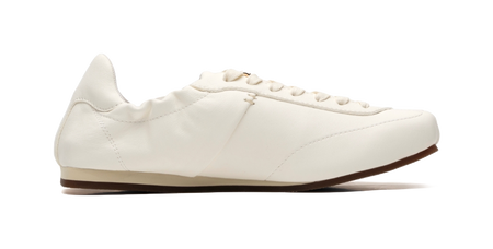 Antique white low-top trainers side angle, lace-up front and stitched upper panels