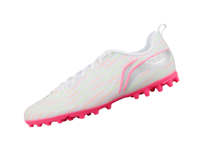 Youth multi-ground soccer shoe angled side view, white upper with pink outsole