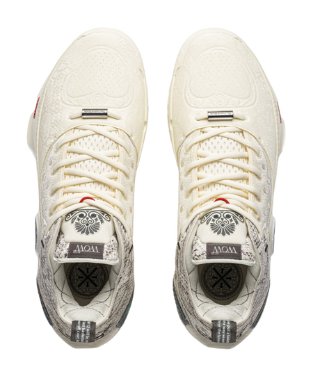 Pair of ecru basketball shoes, front view with lace-up closure and padded tongue