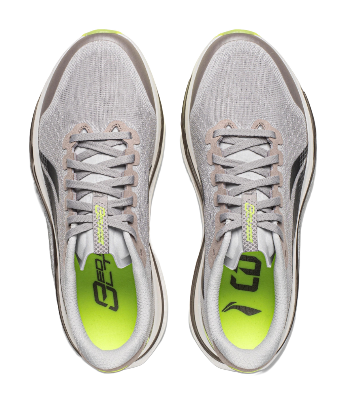 Pair of women's low-top running shoes, calm gray uppers with lace-up closure and neon lining