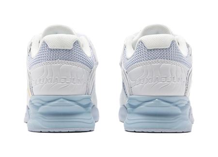White low-top training shoes, back view with light-blue heel cushioning