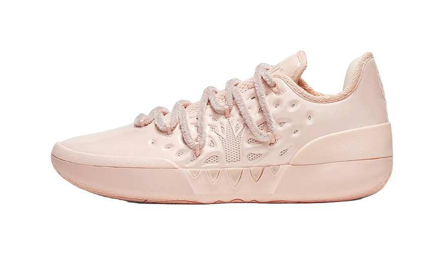 Soft pink low basketball shoe, lace-up with textured paneling and padded collar