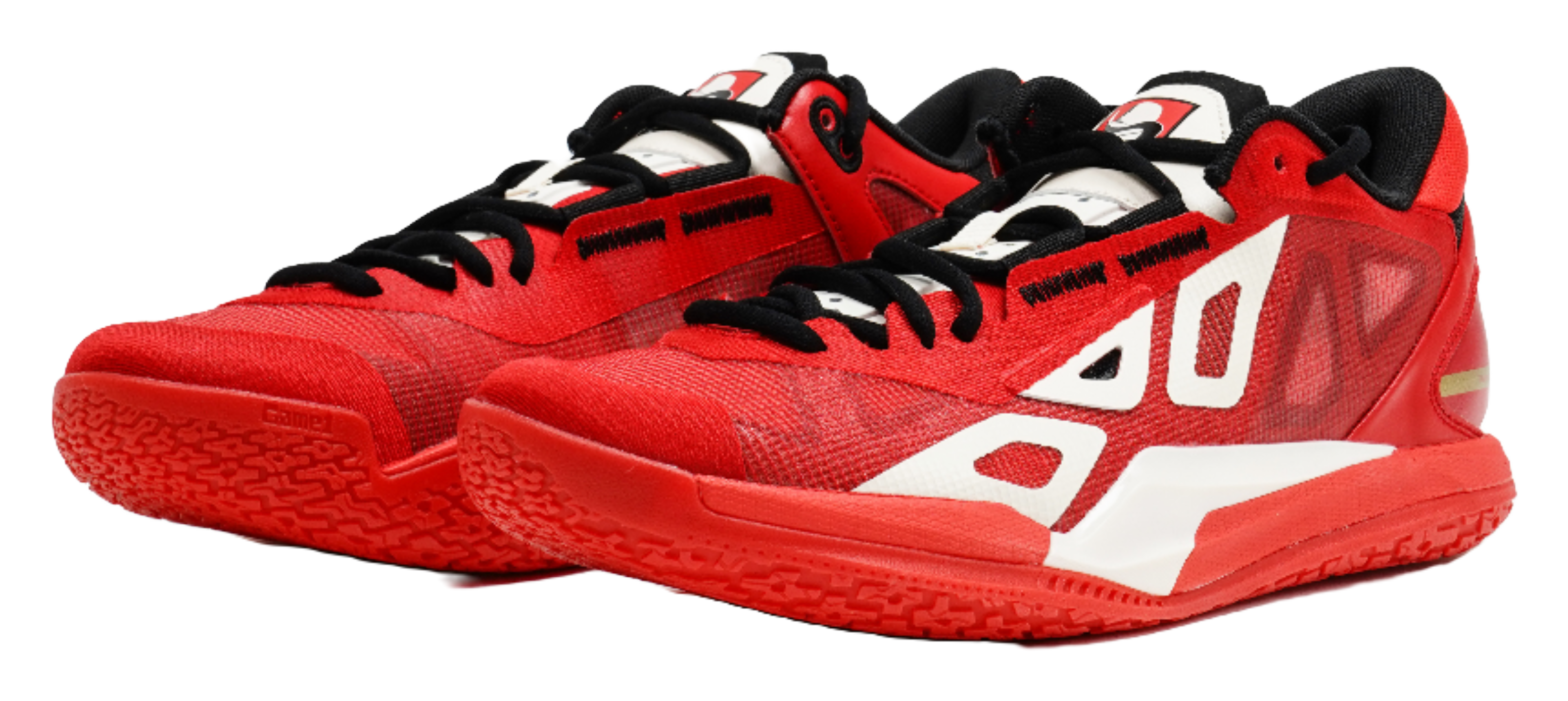 Red low-top basketball shoe with white stripes, black collar, and thick red sole