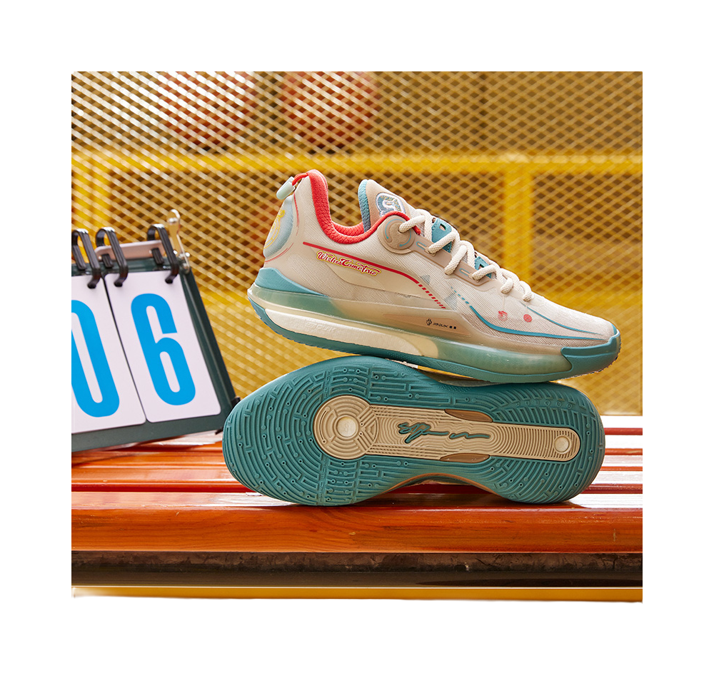 Unisex basketball shoe on court bench; oat beige, teal sole, red heel accent