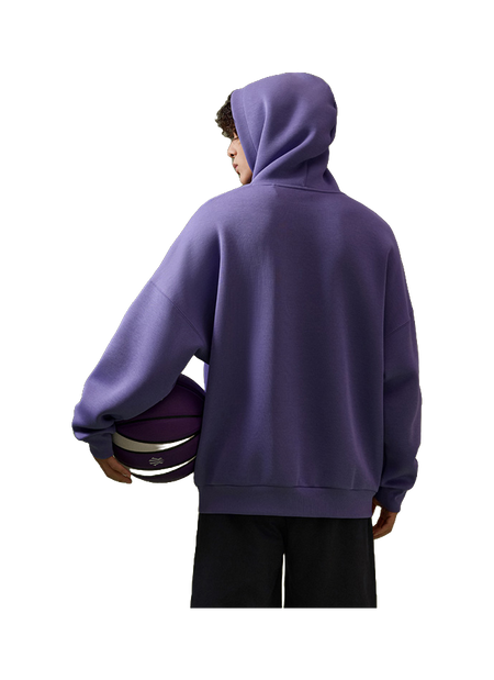 Purple unisex pullover hoodie sweatshirt on model, back view with hood and pocket hem