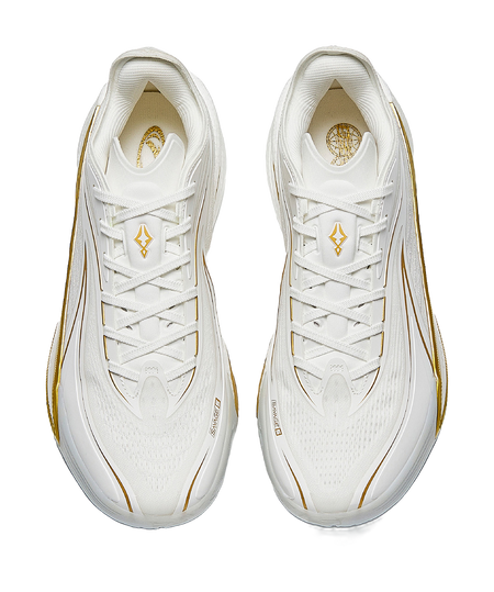 Pair of men's white low-top basketball shoes with gold detailing and lace-up