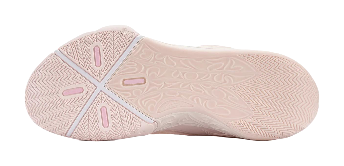 Light pink basketball shoe outsole with herringbone tread and traction symbols