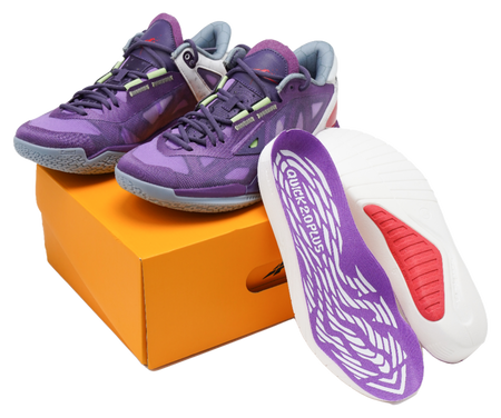 Purple basketball shoes showing off-white insole with white traction graphic and red pad