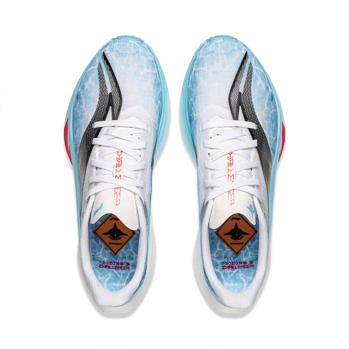 Men's running shoes front view, white laces and blue patterned uppers with red logo accents.