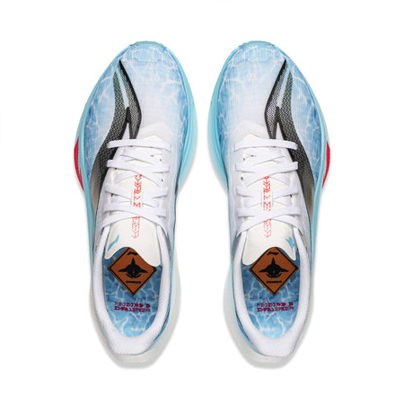 Men's running shoes front view, white laces and blue patterned uppers with red logo accents.
