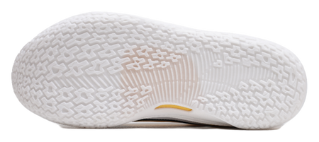Basketball shoe outsole, textured white rubber tread with yellow accent