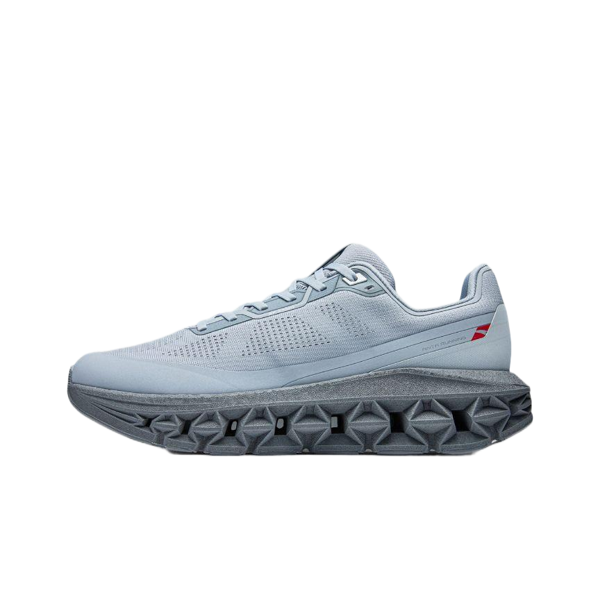 Light blue lace-up running shoe with perforated upper and geometric tread midsole