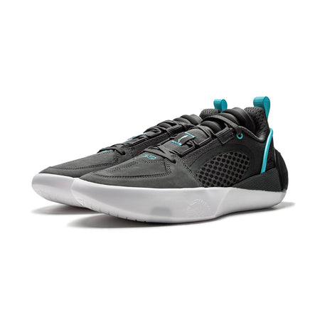 Men's basketball shoe front-angled, dark charcoal upper, teal heel loop, white midsole