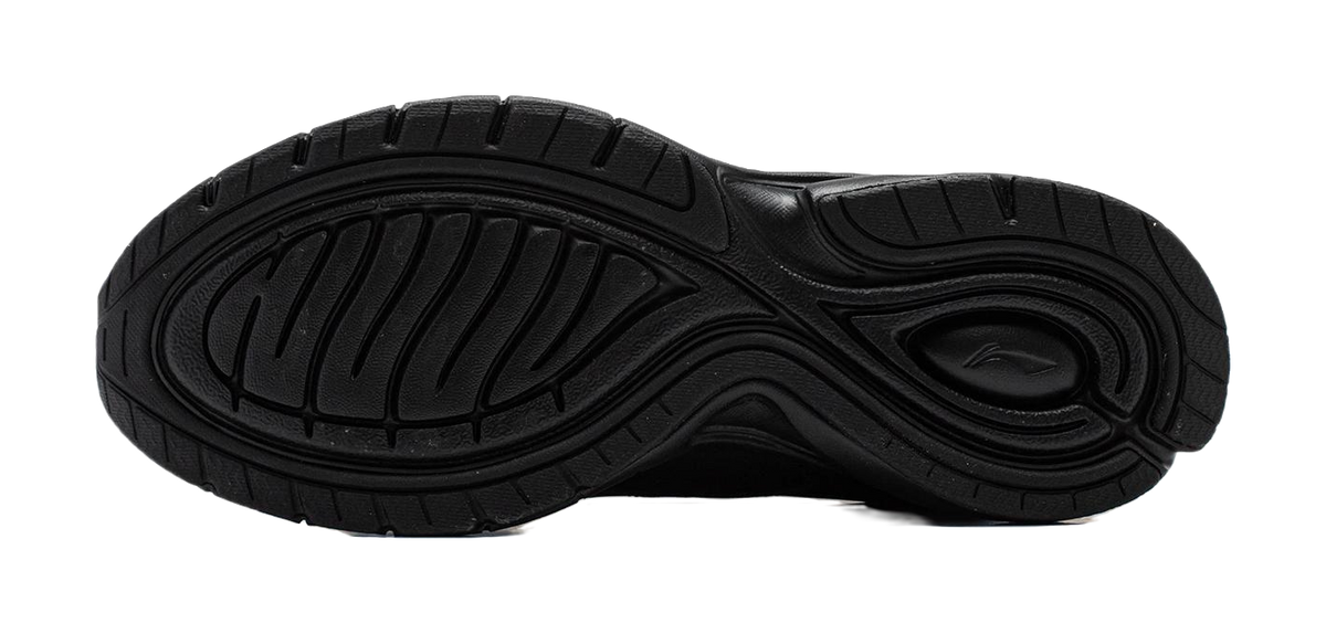 Black running shoe outsole with deep tread pattern and flex grooves