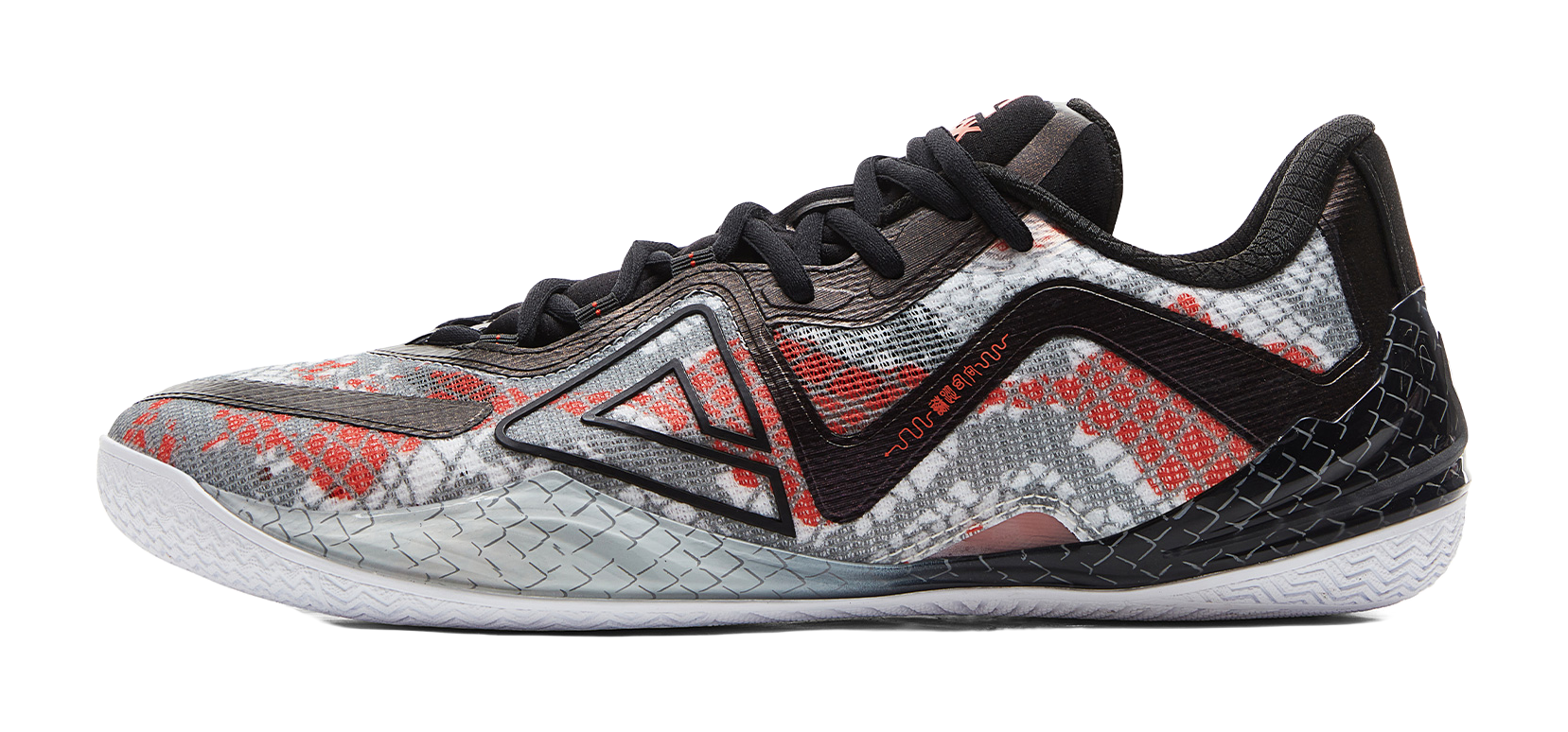 Black and red basketball shoe with speckled pattern and black laces